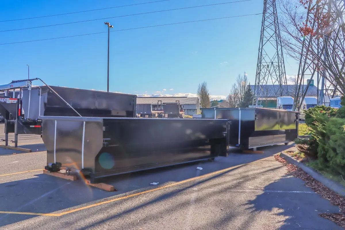 Roll-off dumpster ready for waste disposal at job site for Construction Dumpster Rental in Rice Lake